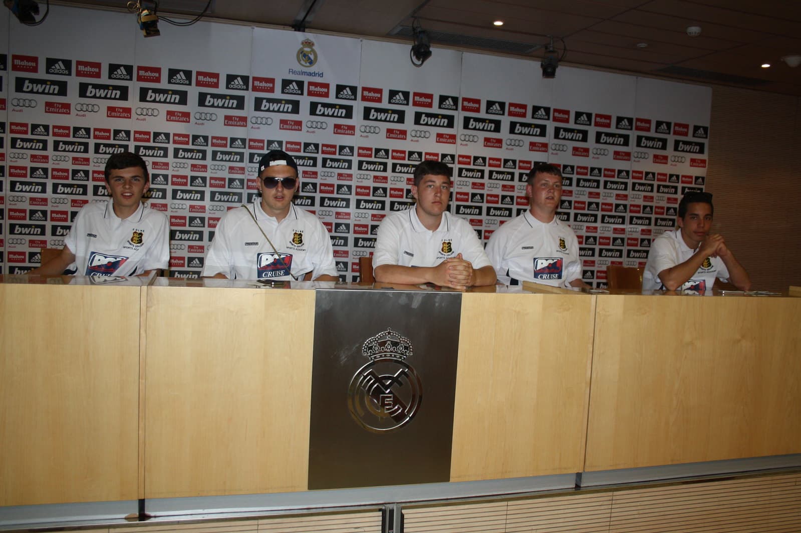 Youth soccer players in the press room at Santiago Bernabeu stadium