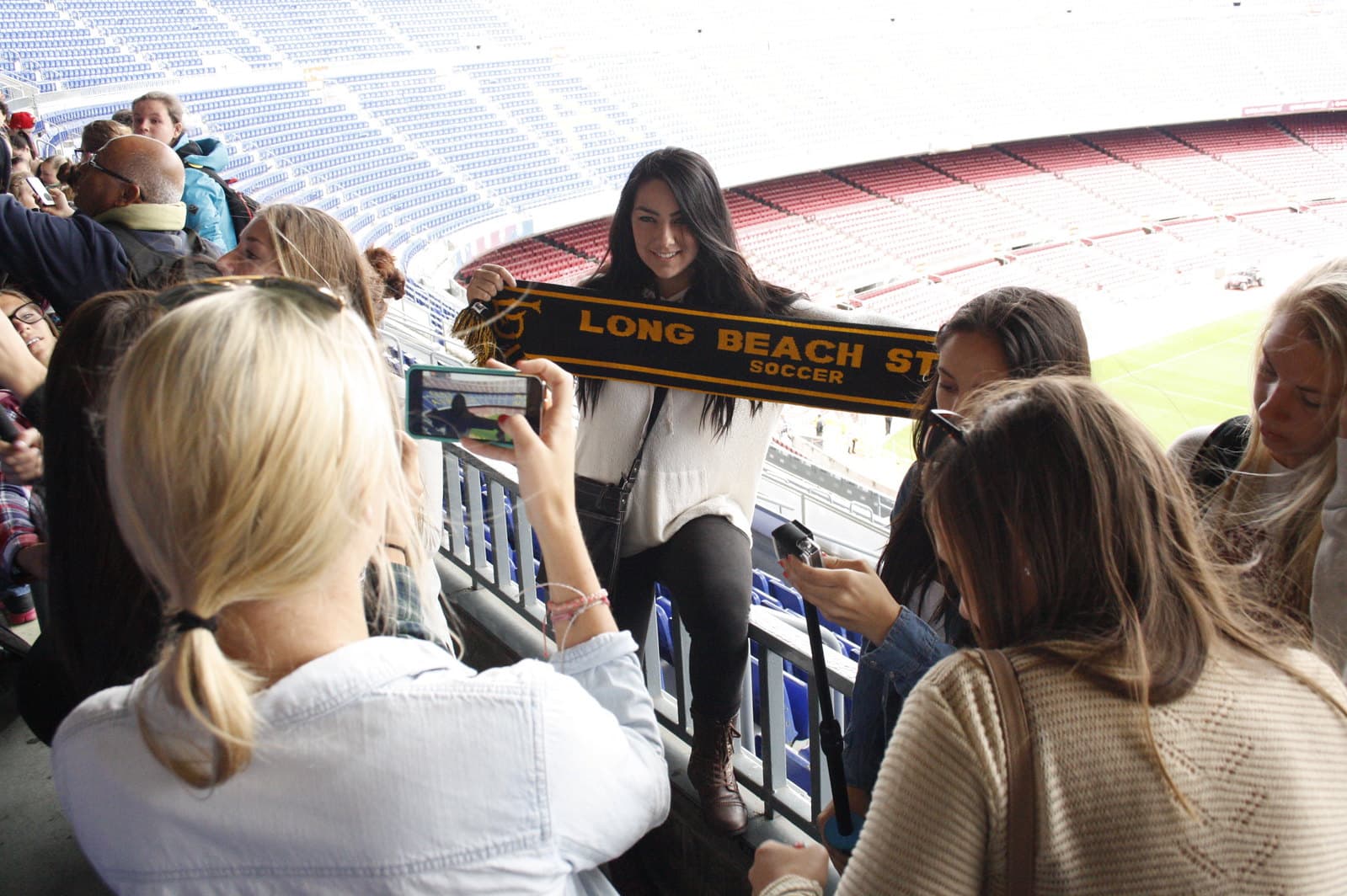 Youth soccer team visiting Camp Nou stadium in Barcelona during an international tour
